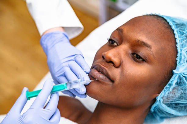 Woman receiving a cosmetic skin treatment